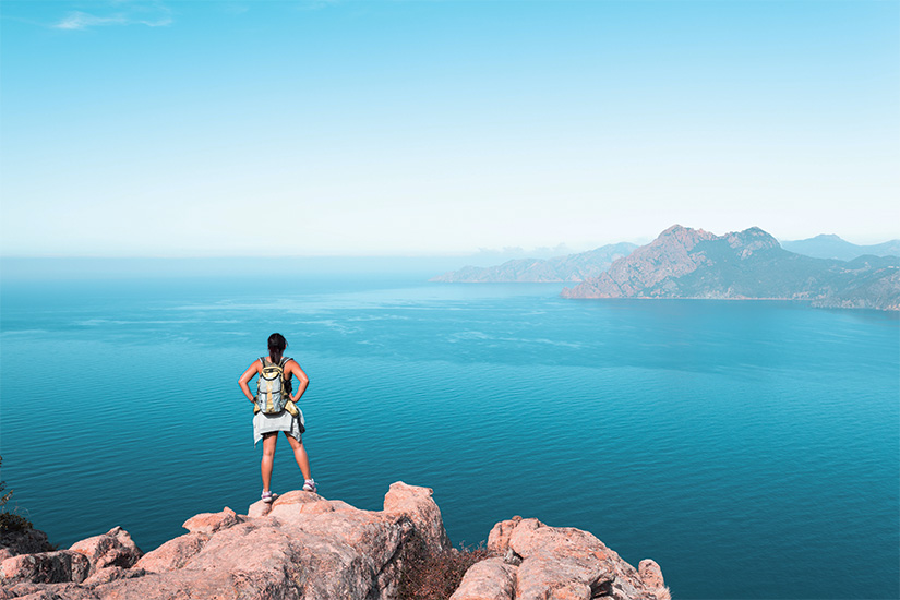 (image) image Randonneuse regardant la vue a Calanques de Piana en Corse France 91 as_206464483